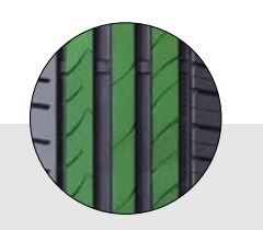 Continuous and solid central rib on the tyre circumference
